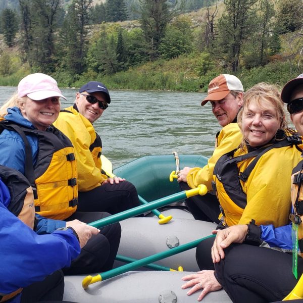 a group of people on a raft