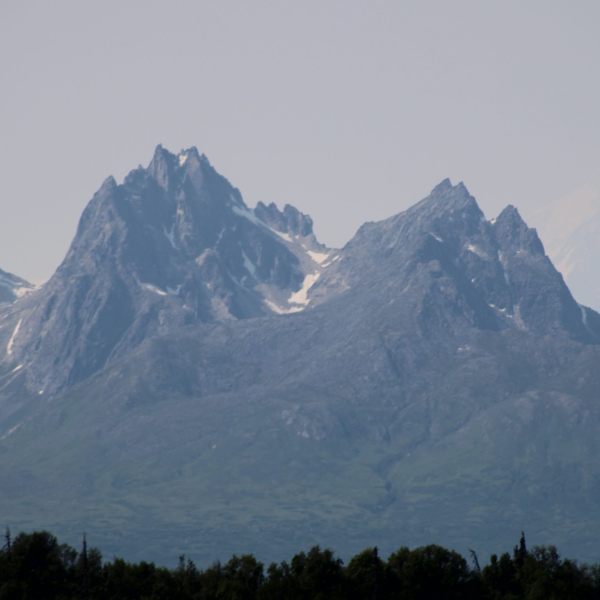 a large mountain in the background