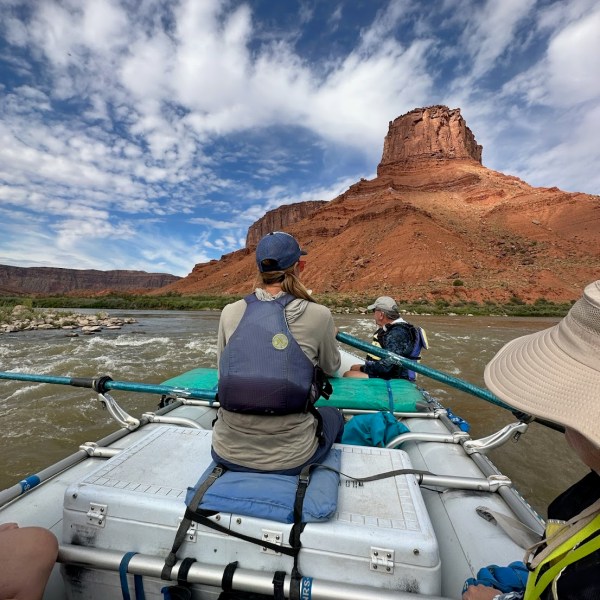 a boat sitting on top of a mountain